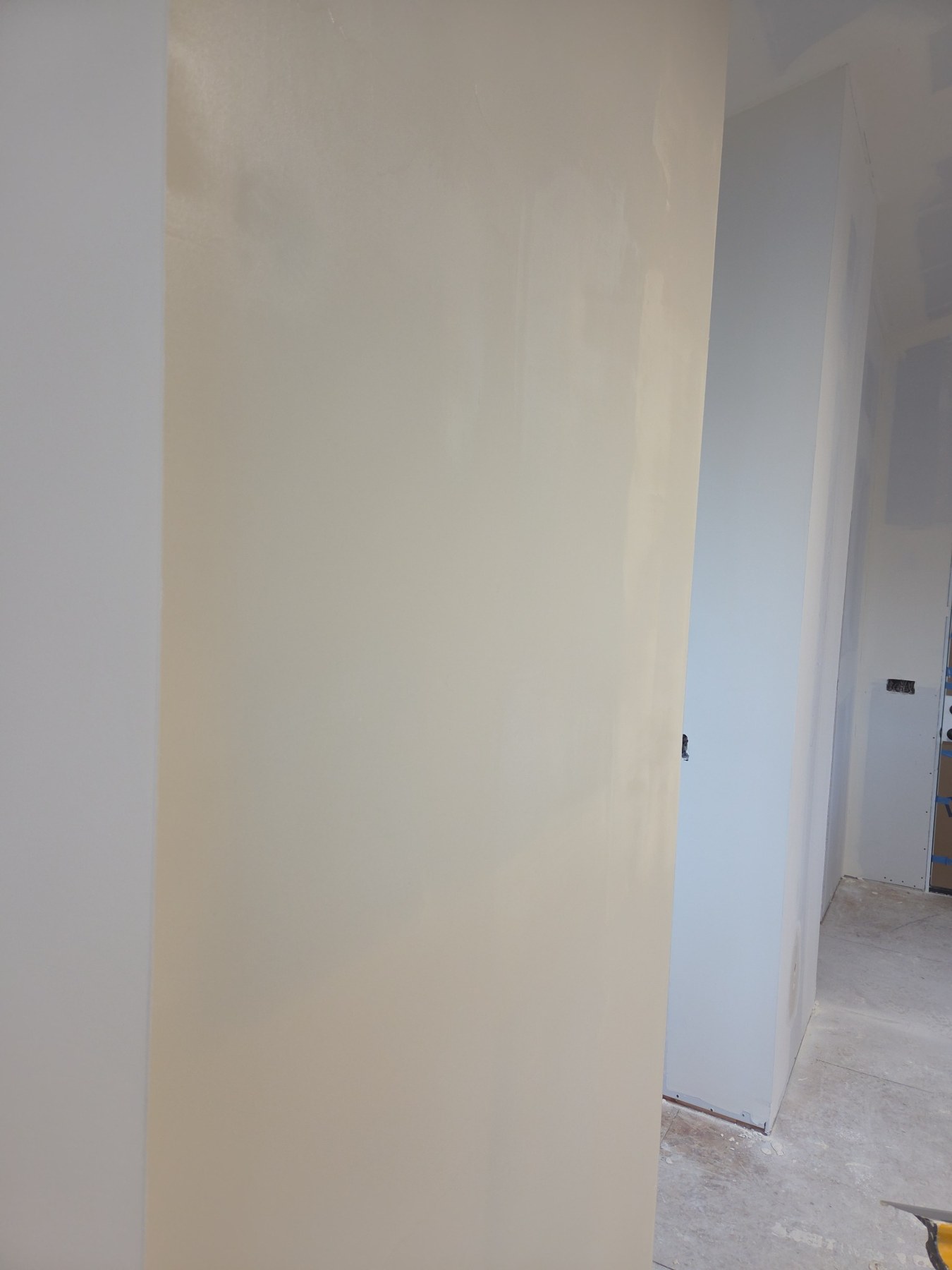 Wall top-coat detail on a Class 5 smooth wall project in Bainbridge Island